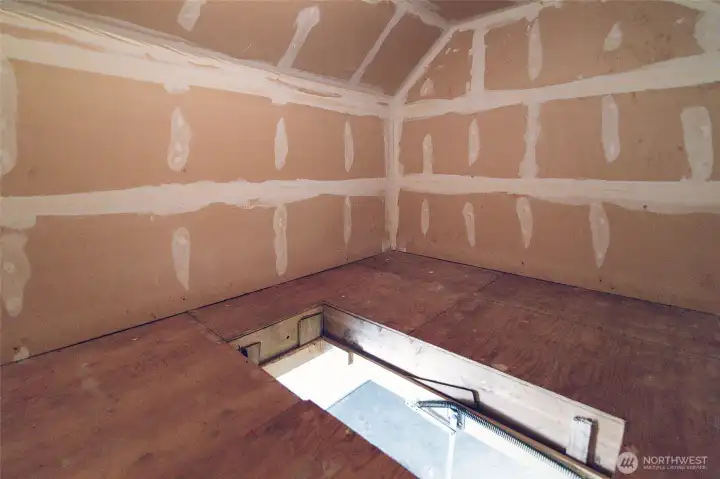 One side of the attic storage above the Garage; each unit has their own space above the garage.