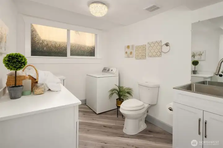 Laundry w/half bath, Third full bath (adjacent room) plumbed and ready! Laundry w/half bath, Third full bath (adjacent room) plumbed and ready!