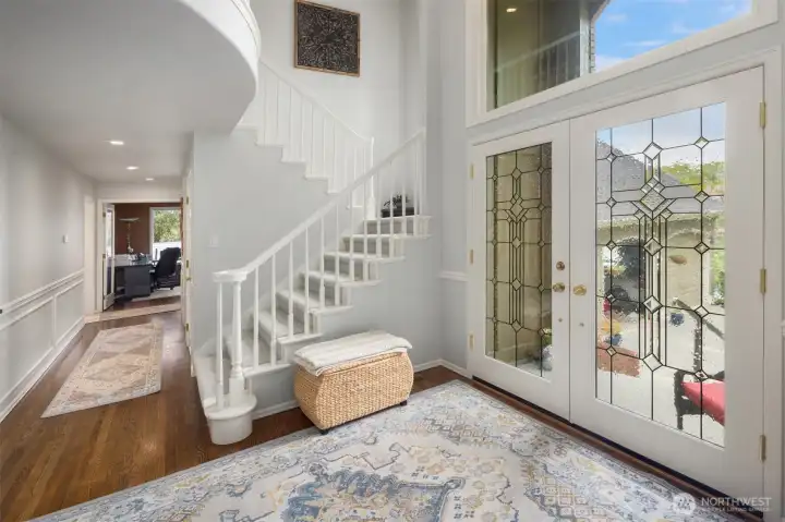 Bright, welcoming home entryway with a clean, classic design