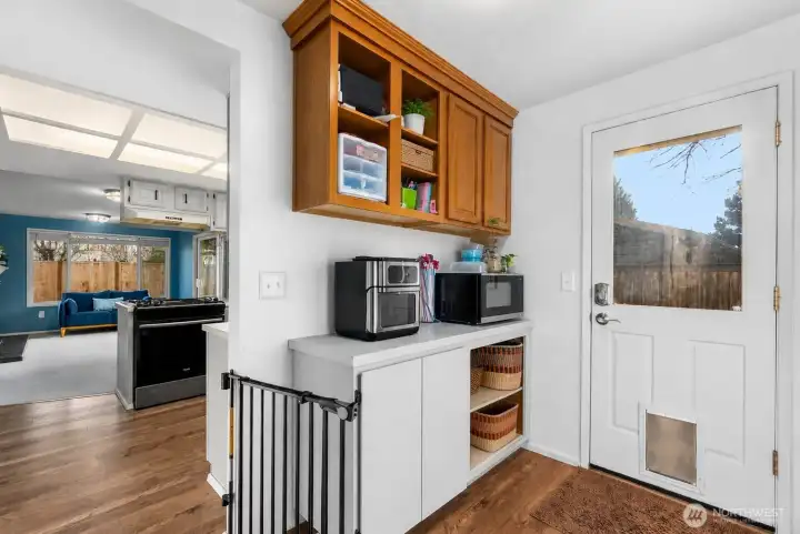 Mudroom off the back of the kitchen, opens to backyard Mudroom off the back of the kitchen, opens to backyard