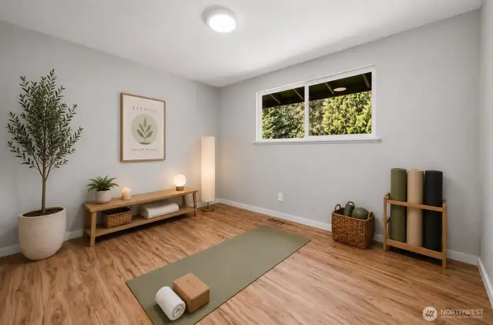 Third Upstairs Bedroom Virtually staged as a yoga studio.