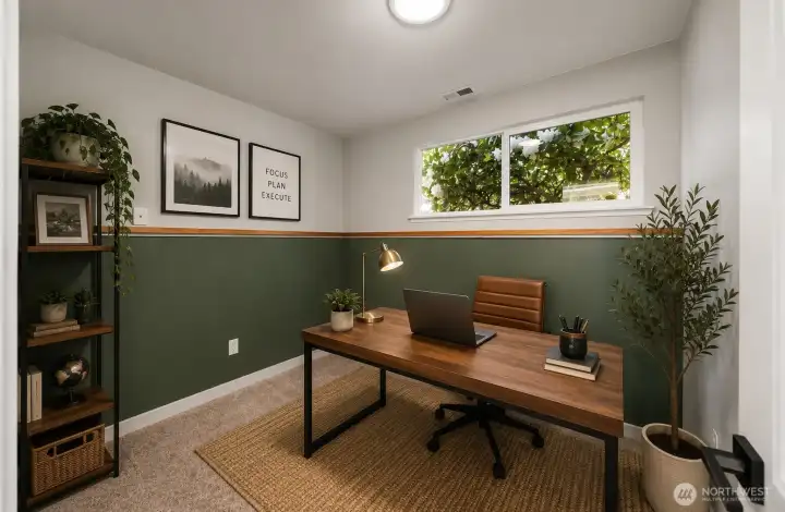 Downstairs side room staged as an office.
