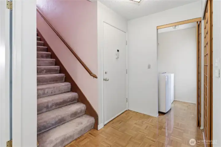 Laundry room with generous window to the left of the entry. Laundry room with generous window to the left of the entry.