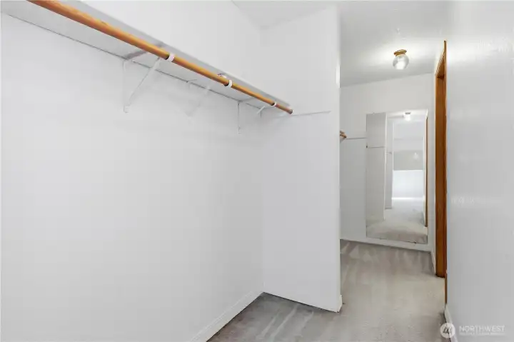 Primary walk in closet Primary walk in closet