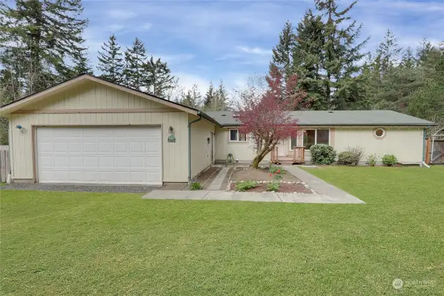 Spacious 1763 sq. ft. home within walking distance of Carney Lake for Summer Fun! Updated home boasts 3 bdrms with walk in closets, 2 baths, vaulted ceilings, skylights, laminate floors, and attached 2 car garage.