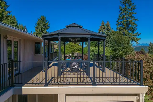 Large deck area just off of the living room has incredible viewing areas and is a large open area for outside living.