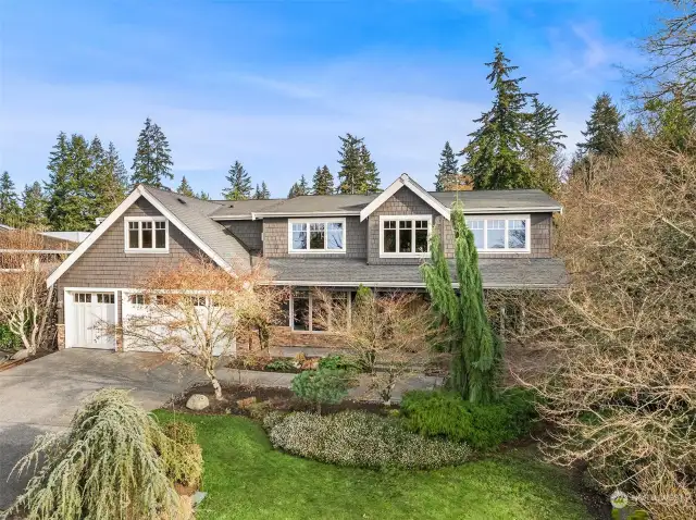 Smartly sited on a quiet Houghton street is this majestic, quality-built custom Craftsman adjacent to Kirkland's Watershed Park. A Rare, flat, huge, kickball-sized 15,000 SF private lot, and great outdoor space.