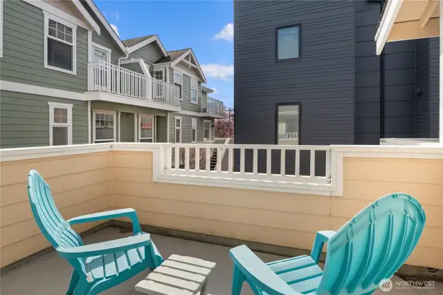 Your own private south-facing deck off the living room is perfect for catching some rays.