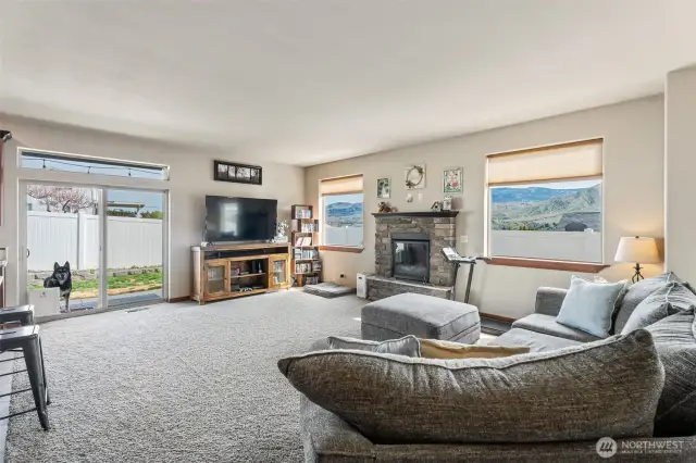 Open living room with gas fireplace