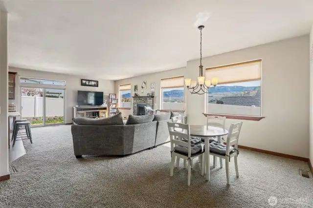 Nice views from the open dining, living and kitchen. Slider to patio and fenced back yard.