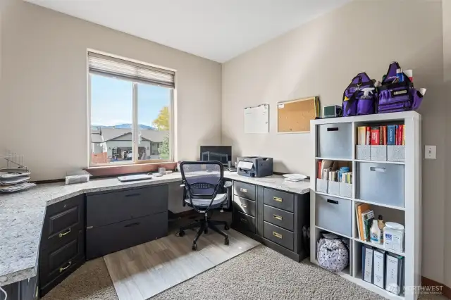 Bedroom 1 in front of house set up as office.