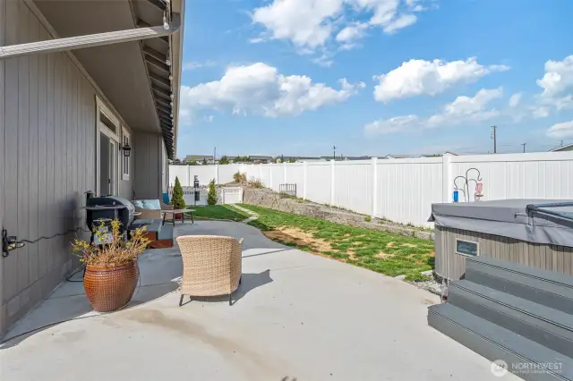 fenced backyard with irrigation water