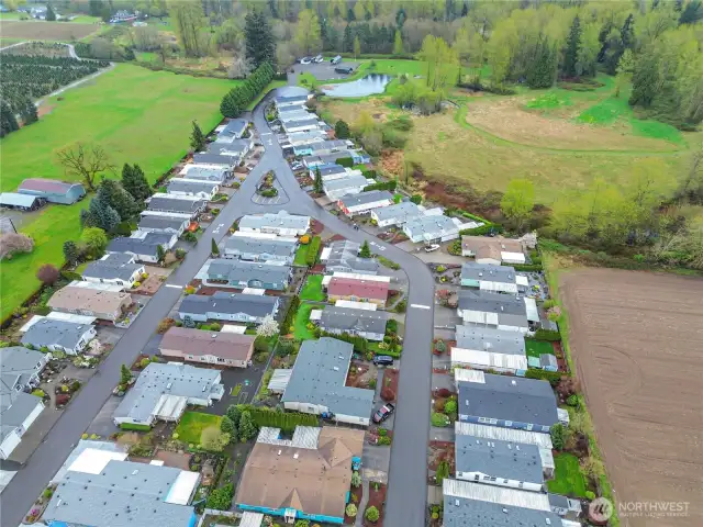 Aerial view of the community that leads back to rv parking and walking trails in this beautiful country setting.
