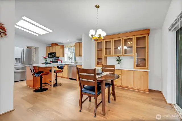 Dining area off the living room and kitchen with a good size built in china hutch.