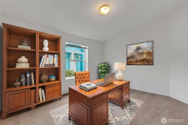 This is the den/office off of the entry and has been virtually staged for your enjoyment.