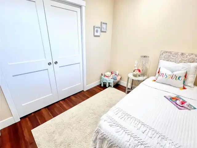 Guest Bedroom with double pocket doors.