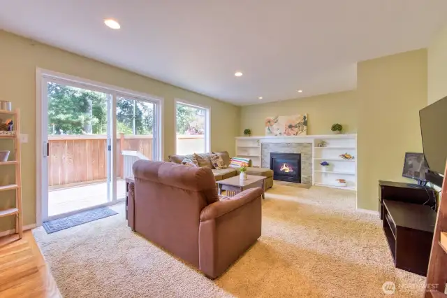 Family room with access to another deck.
