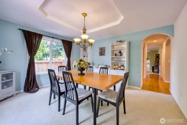 Formal dining room w/ beautiful tray ceilings.next to kitchen.