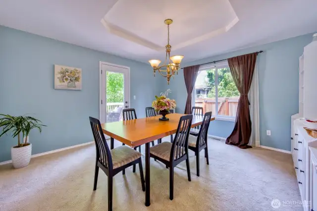 Spacious formal dining with access to deck #1.
