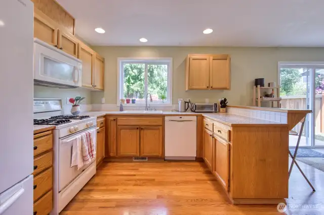 well laid out kitchen next to family room.
