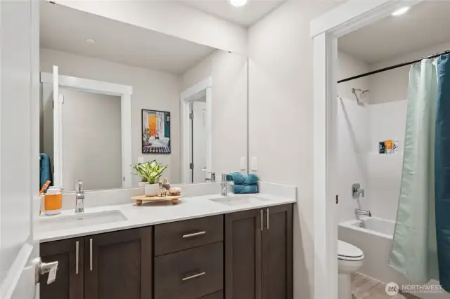 Hallbath: Photo rendering is representational. Actual home is under construction and finishes, elevation, and paint colors may vary. See site agent for details.