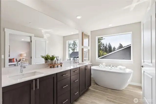 Primary bath:Photo rendering is representational. Actual home is under construction and finishes, elevation, and paint colors may vary. See site agent for details.