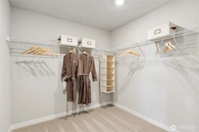 Primary closet: Photo rendering is representational. Actual home is under construction and finishes, elevation, and paint colors may vary. See site agent for details.