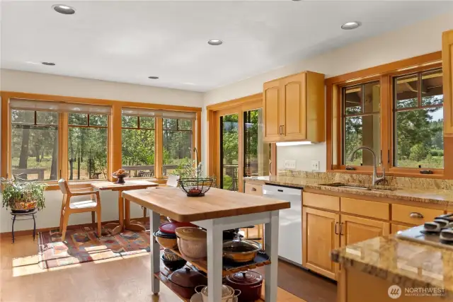 Sunbathed interior warm the heart and welcomes the day! Slider door opens onto deck for easy flow indoor-outdoor action.