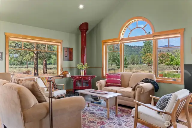 Gracious proportions extended by large wall of windows that capture views of MOunt Gardner, Sun Mountain Lodge and Patterson Mountain!