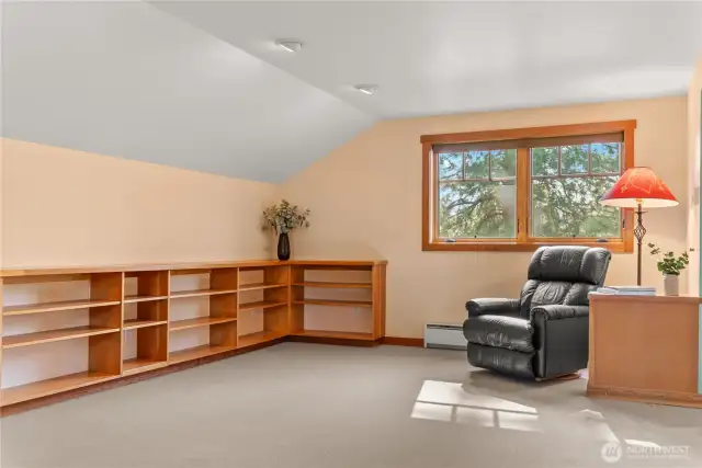 Spacious open second floor has enough room to be used in multiple ways.
