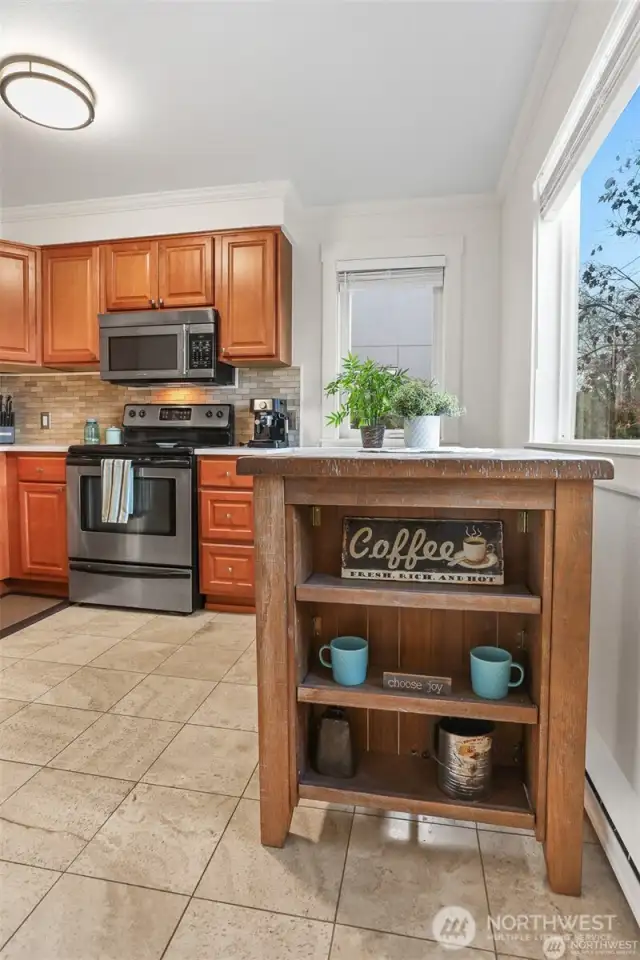 Kitchen area with eat in space