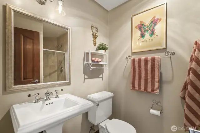 Private ¾ bathroom off the third ensuite bedroom—perfect for kids and guests alike.