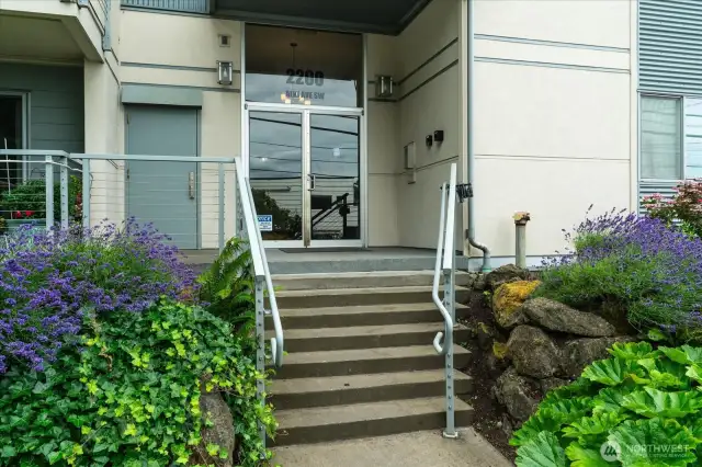Secure entrance with automatic locking doors at front entrance, and private garage with assigned parking spots and storage area