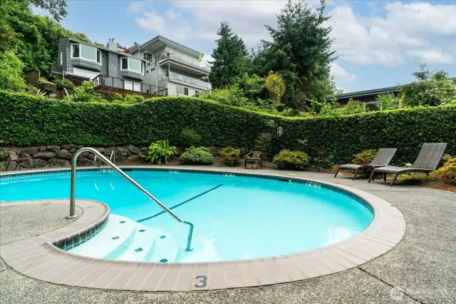 Enjoy some sunny relaxation at the community private pool area, with heated swimming pool