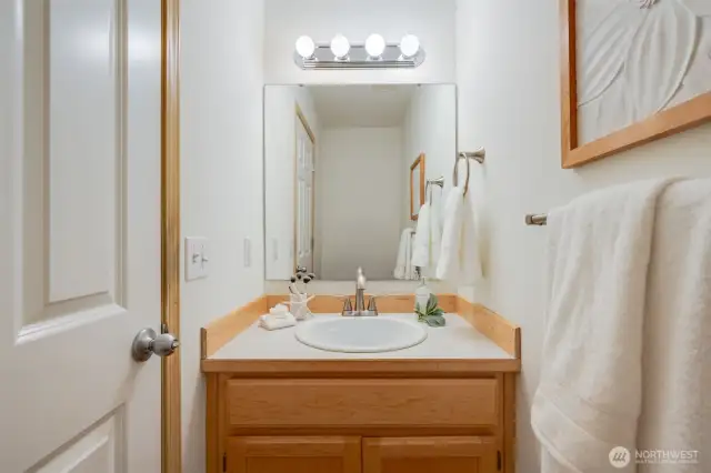 Shown here is the half bath conveniently located on the main floor.