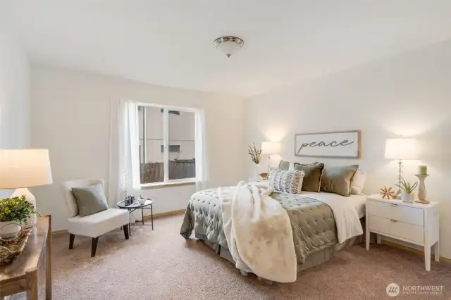 The generous primary bedroom is located on the main floor.