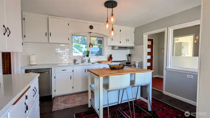 Updated Kitchen with Quartz countertops and Stainless Steel appliances!