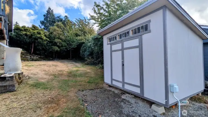 Rear Shed with approximately 80 sqft of storage, 220 outlet and cleanout!