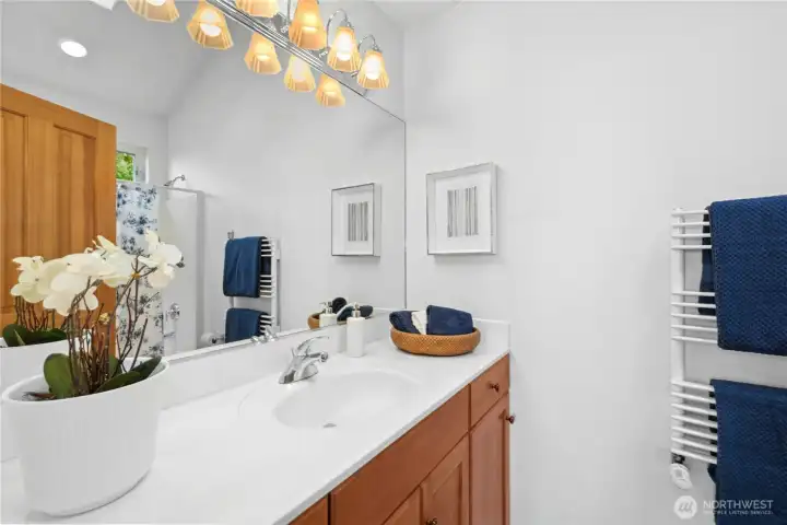 Main floor bathroom with heated towel bars