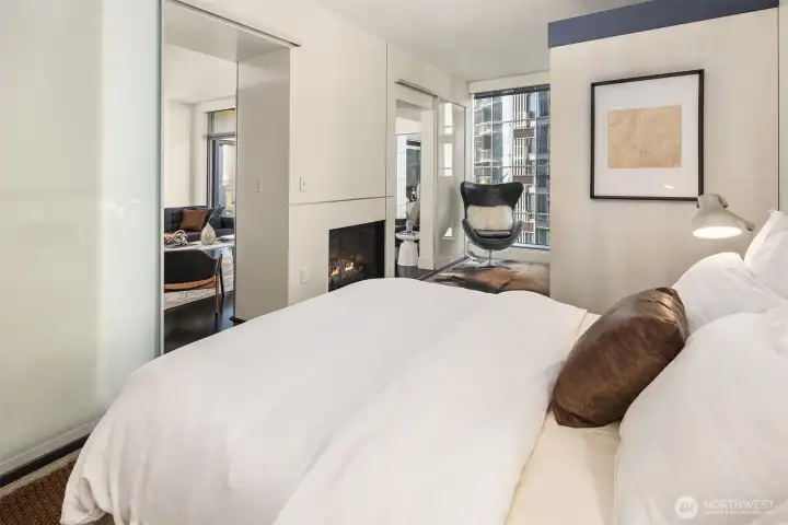 Fireplace opens to both living room and bedroom