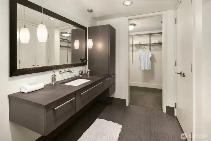 Bathroom opens up to walk in closet