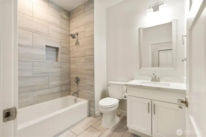 Main floor full bathroom off entryway Main floor full bathroom off entryway