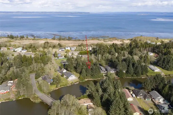 Parcel for sale is in between two other vacant lots.