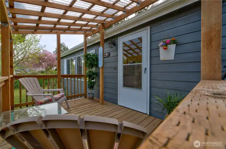 Front entry porch with clear roof.