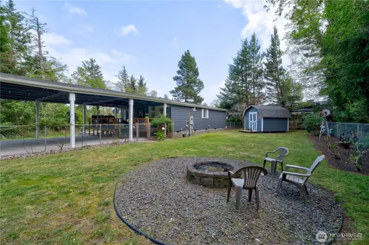 Firepit area in back yard.