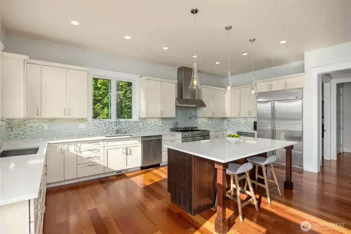 Quality stainless appliances. Two large pantries are out of view providing additional storage. Quality stainless appliances. Two large pantries are out of view providing additional storage.