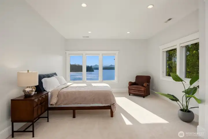 Upper-level bedroom #3 also enjoys the view of the Bay and the mountains Upper-level bedroom #3 also enjoys the view of the Bay and the mountains