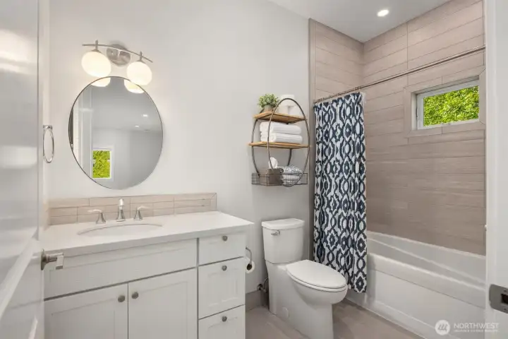 The upper-level 4th bedroom is currently used as a bonus room/exercise room and enjoys views of the private gardens. This room has an attached bath and could easily be used as a bedroom. The upper-level 4th bedroom is currently used as a bonus room/exercise room and enjoys views of the private gardens. This room has an attached bath and could easily be used as a bedroom.