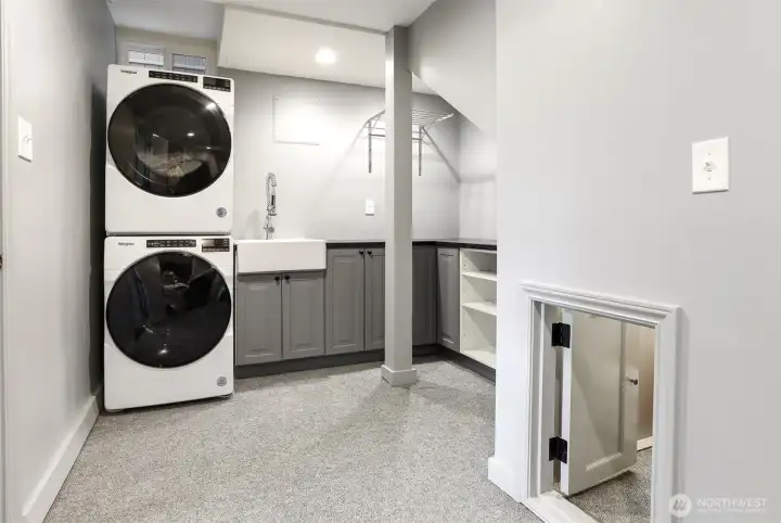 The large laundry room in the basement.