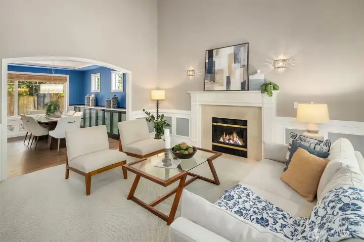 Formal living with gas fireplace.